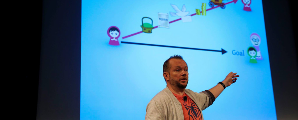 Per Axbom pointing to slide from his presentation The Invisible Problem with Fairy Tale Experiences