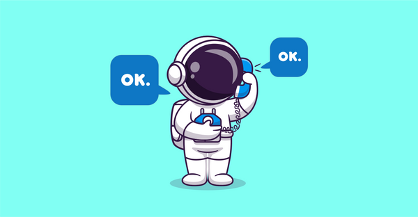 Astronaut talking on a vintage phone. Astronaut says “OK.” and gets the exact same response in the handset: “OK.”
